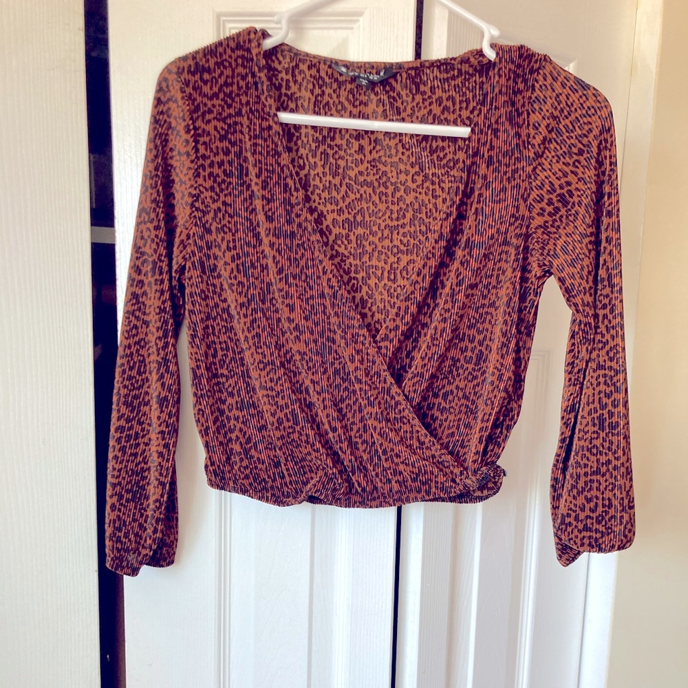 Tiger/cheetah wrap style top